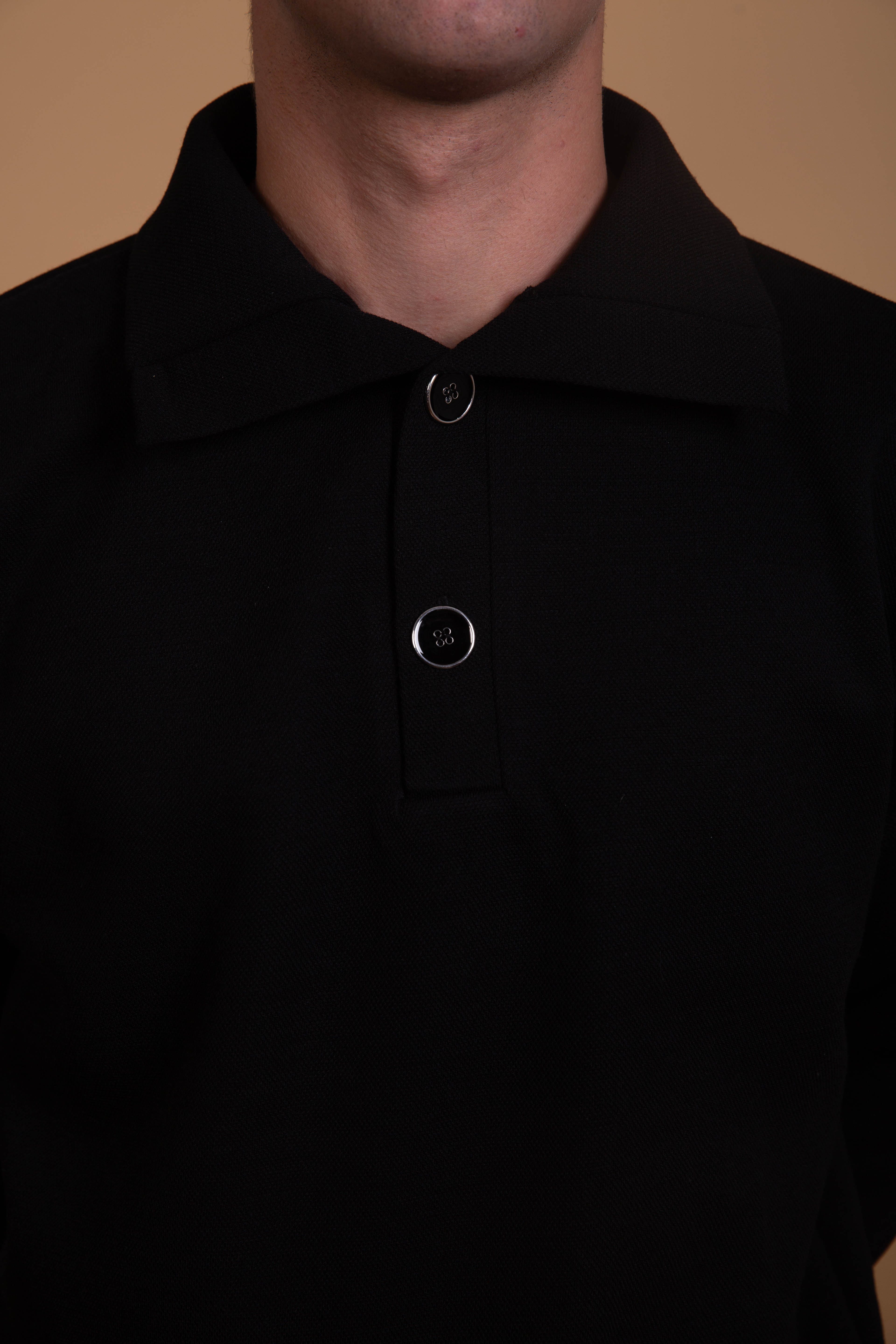 René — Polo noir maille piquée
